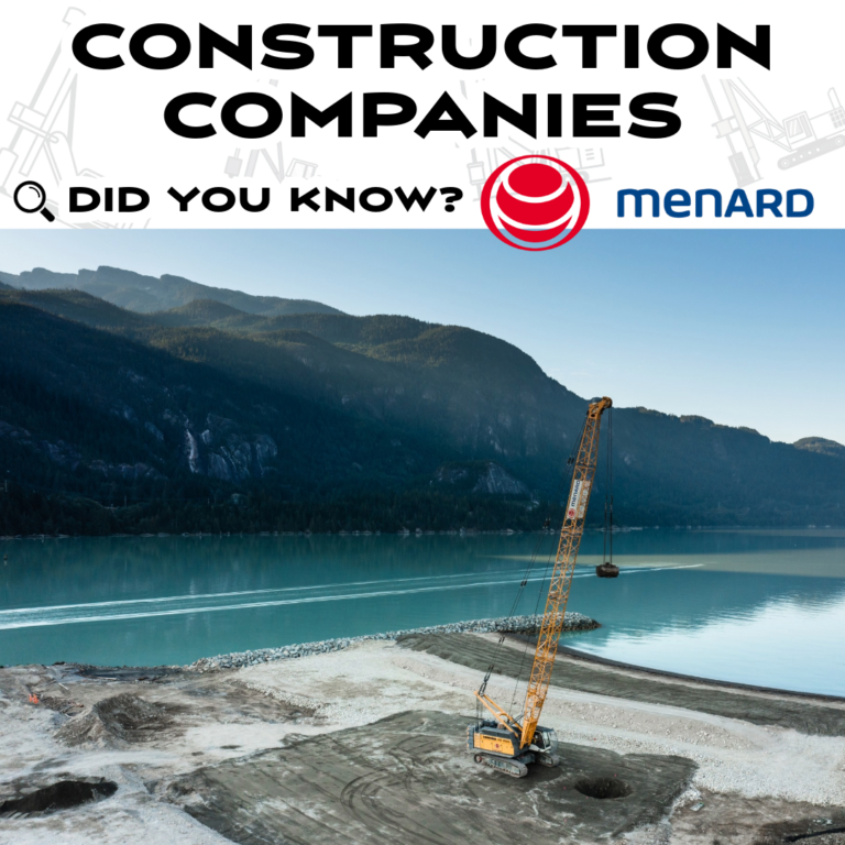 Menard dynamic compaction rig working at waterfront site with mountains in background